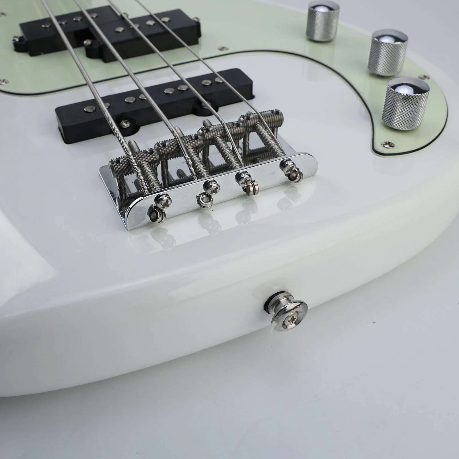 Chrome Electric Bass Guitar Bridge with Stainless Steel Threaded Saddles Plate 4 String Fixed Bridge Compatible with Vintage style Fender Jazz Precision Bass Bridge Replacement Parts 4 Piece Chrome - Image 7
