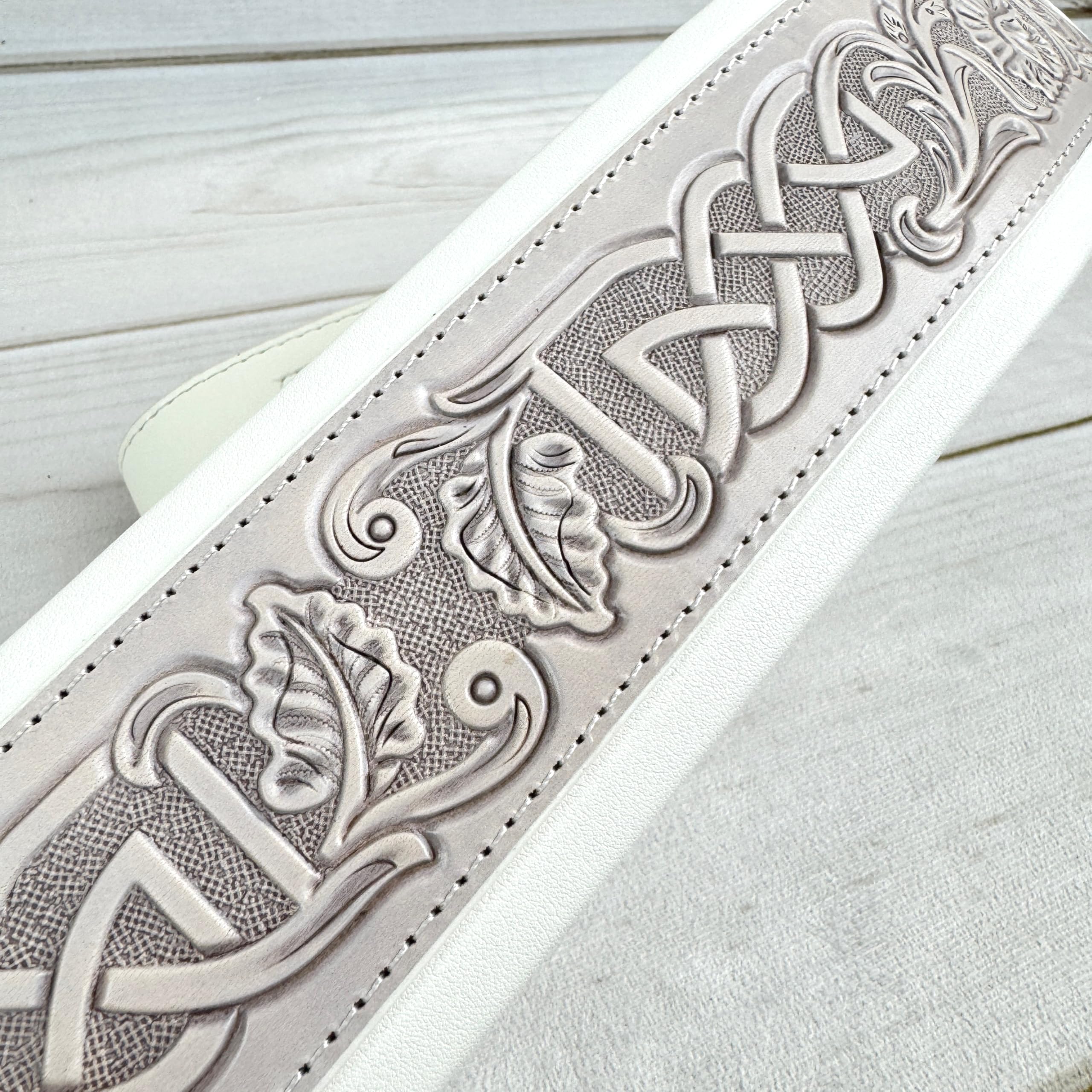 Walker And Williams KB-05-WHT Aged White Celtic Knot Full Grain Carving Leather Padded Strap With Arctic White garment leather Backing For Acoustic, Electric, And Bass Guitars - Image 5