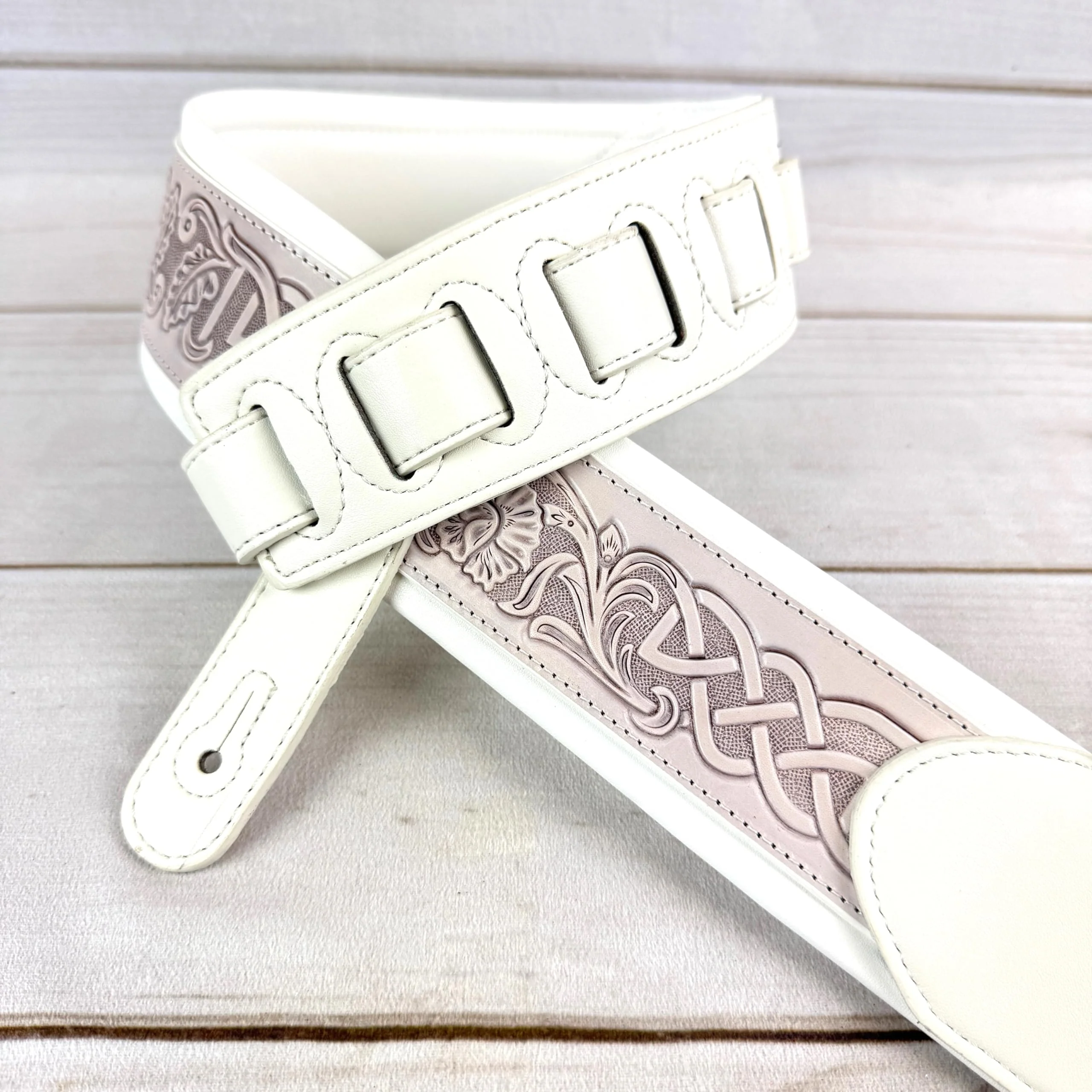 Walker And Williams KB-05-WHT Aged White Celtic Knot Full Grain Carving Leather Padded Strap With Arctic White garment leather Backing For Acoustic, Electric, And Bass Guitars - Image 7
