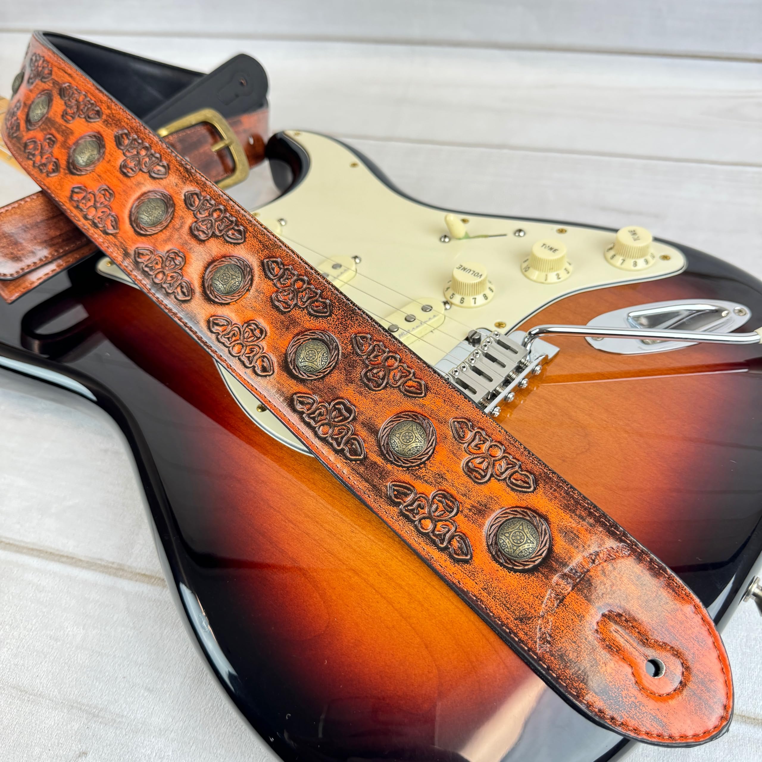 Walker & Williams GE-202 Antique Amber Tan Padded Guitar Strap with Brass Coin Studs, Brass Buckle, And Celtic Tooling For Acoustic, Electric, And Bass Guitars - Image 2